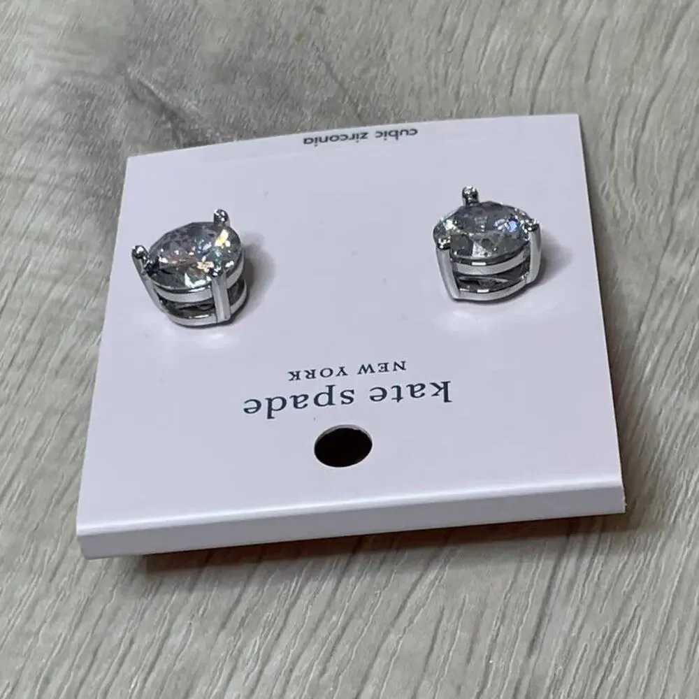 Kate Spade Round Rise and Shine Clear Stone Silver Patin Tone Earrings